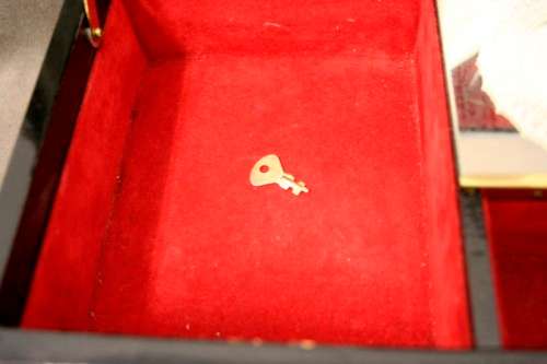 A gorgeous vintage Chinese jewellery box with a mirror, lock and key. Lovely on a dresser.