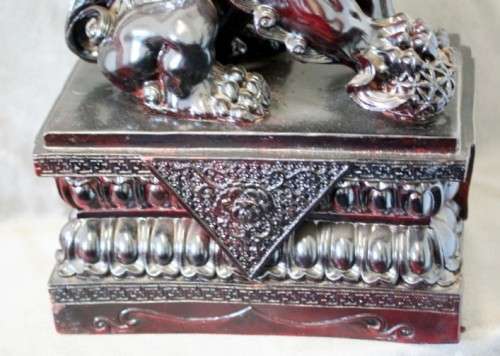 A spectacular pair of Oriental large red resin foo dogs/ temple lions in stunning condition.