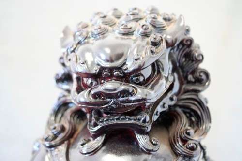 A spectacular pair of Oriental large red resin foo dogs/ temple lions in stunning condition.