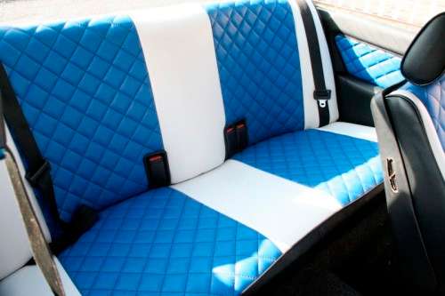 A highly collectible 1989 BMW (E30) converted to 325IS Coupe in metallic blue 99% restored.