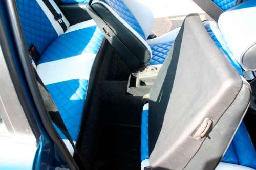 A highly collectible 1989 BMW (E30) converted to 325IS Coupe in metallic blue 99% restored.