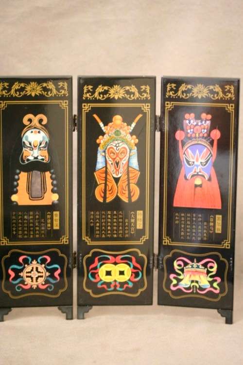 A stunning six-panel black lacquer ornamental divider depicting the "facial make up of Peking Opera"