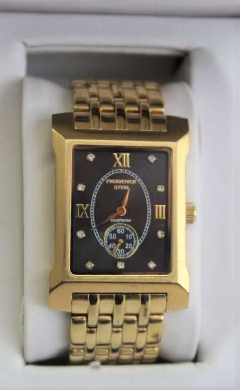 A classy original Frederick Stein Excellence Diamond gold plated gents wrist watch in its box bobshop .za