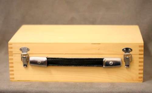 An awesome set of six chrome Chinese Boule balls in a wooden case with instructions for play.