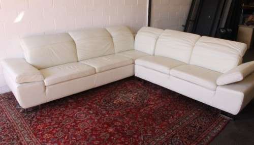 A superb large white genuine full-grain leather corner lounge suite with adjustable headrests