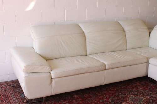 A superb large white genuine full-grain leather corner lounge suite with adjustable headrests