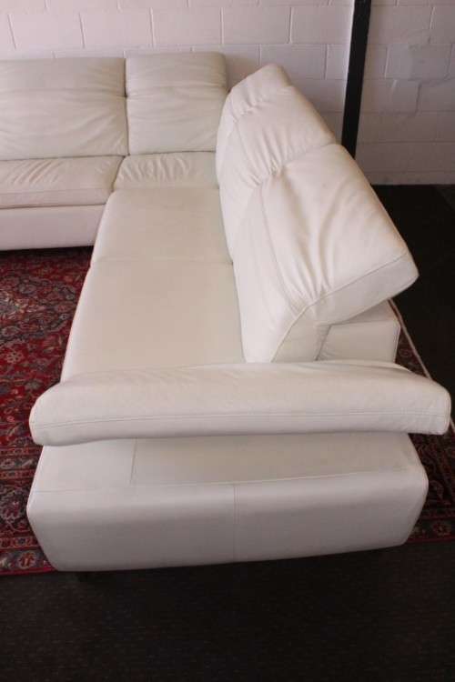 A superb large white genuine full-grain leather corner lounge suite with adjustable headrests