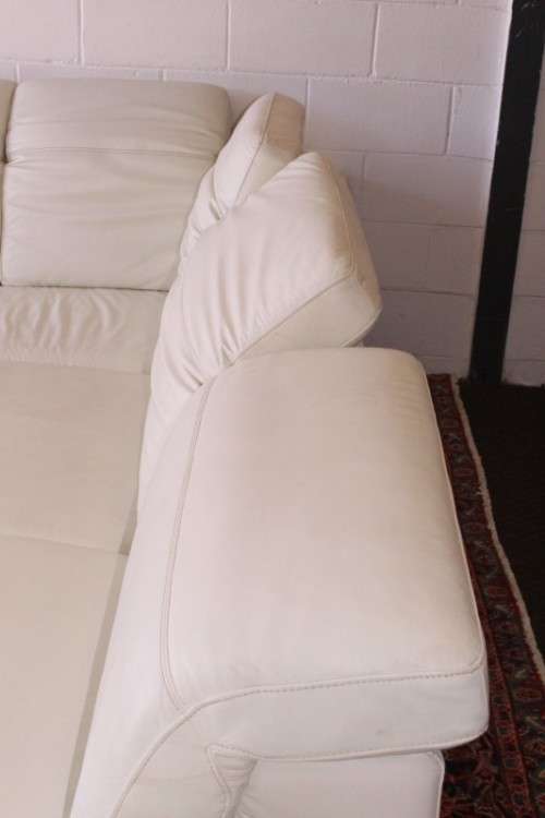 A superb large white genuine full-grain leather corner lounge suite with adjustable headrests