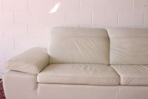 A superb large white genuine full-grain leather corner lounge suite with adjustable headrests