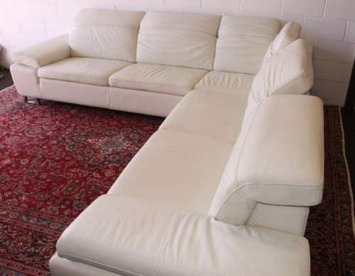 A superb large white genuine full-grain leather corner lounge suite with adjustable headrests
