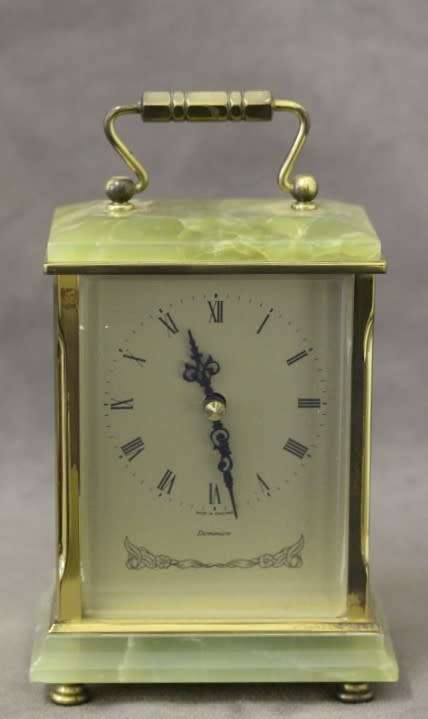 A beautiful vintage "Dominion" brass and marble battery operated carriage clock, working.