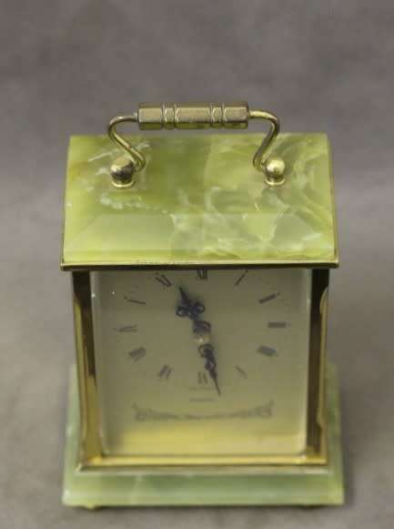 A beautiful vintage "Dominion" brass and marble battery operated carriage clock, working.