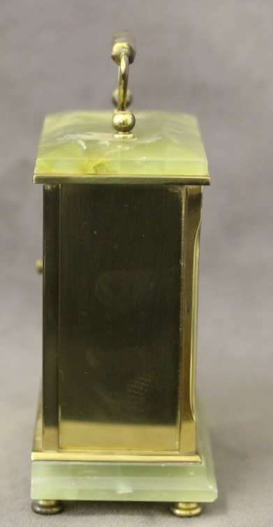 A beautiful vintage "Dominion" brass and marble battery operated carriage clock, working.