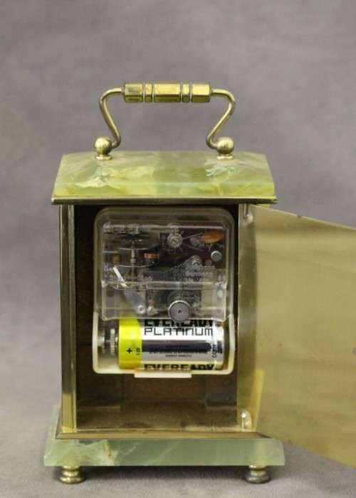 A beautiful vintage "Dominion" brass and marble battery operated carriage clock, working.