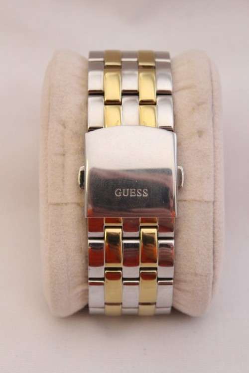 Discounted! White-dial steel & gold plated Guess gents wrist watch with spare links