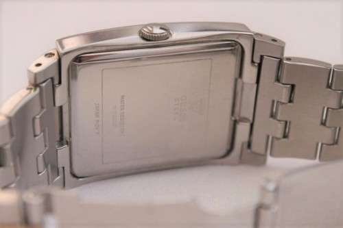 Discounted! White-dial steel & gold plated Guess gents wrist watch with spare links