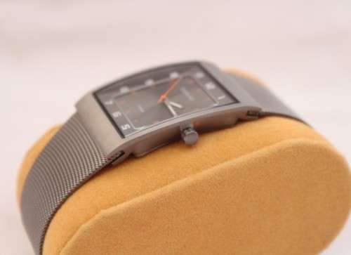 An incredible Bering "Classic" Titanium Slim men's watch with an adjustable black mesh strap