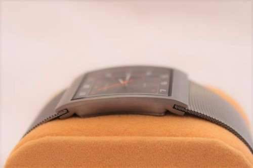 An incredible Bering "Classic" Titanium Slim men's watch with an adjustable black mesh strap