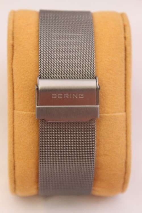 An incredible Bering "Classic" Titanium Slim men's watch with an adjustable black mesh strap
