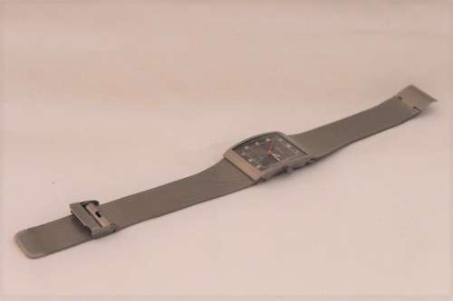 An incredible Bering "Classic" Titanium Slim men's watch with an adjustable black mesh strap