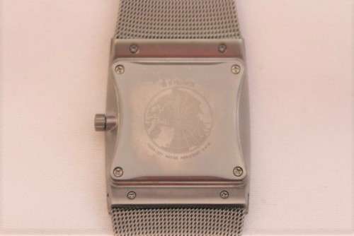 An incredible Bering "Classic" Titanium Slim men's watch with an adjustable black mesh strap