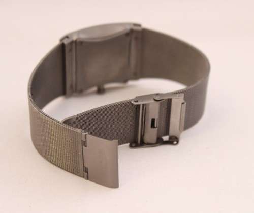 An incredible Bering "Classic" Titanium Slim men's watch with an adjustable black mesh strap