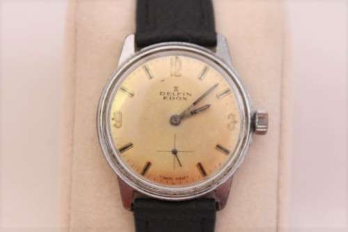 An awesome vintage Swiss made Delfin Edox ladies stainless steel watch with a black leather strap