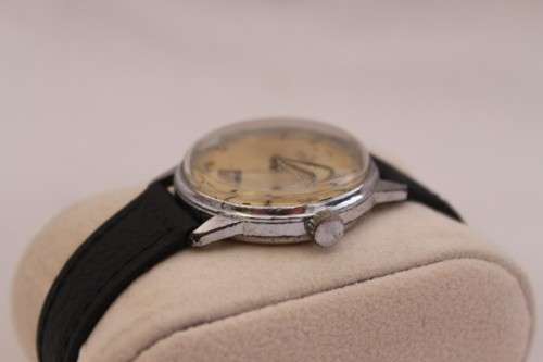 An awesome vintage Swiss made Delfin Edox ladies stainless steel watch with a black leather strap