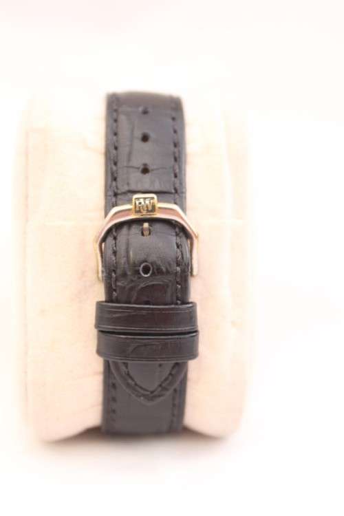A stunning classic Raymond Weil gold plated gents quartz wrist watch with a black leather strap