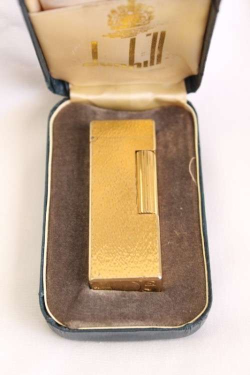A stunning vintage (c1985) gold plated Dunhill Rollagas lighter in its box in working condition