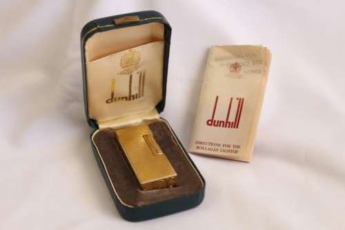 A stunning vintage (c1985) gold plated Dunhill Rollagas lighter in its box in working condition