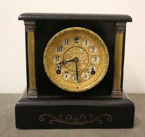 A beautiful, stylish vintage black wood "Sessions" wind up pendulum mantle clock. Working.