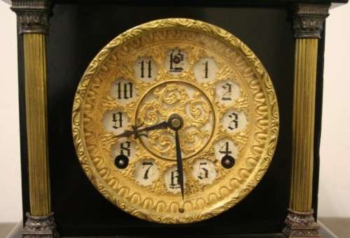 A beautiful, stylish vintage black wood "Sessions" wind up pendulum mantle clock. Working.