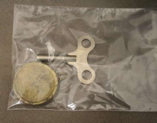 A beautiful, stylish vintage black wood "Sessions" wind up pendulum mantle clock. Working.