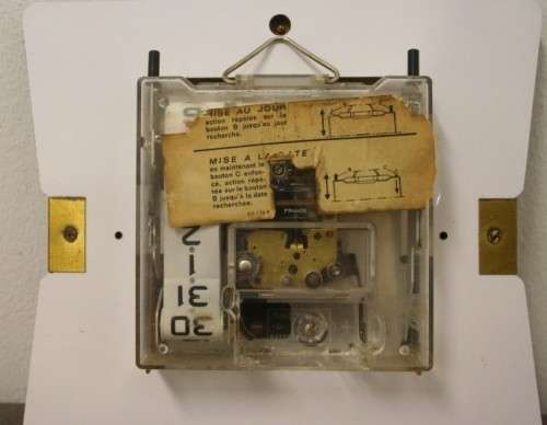 A stylish vintage French "Jaz" battery operated kitchen wall clock. Working.