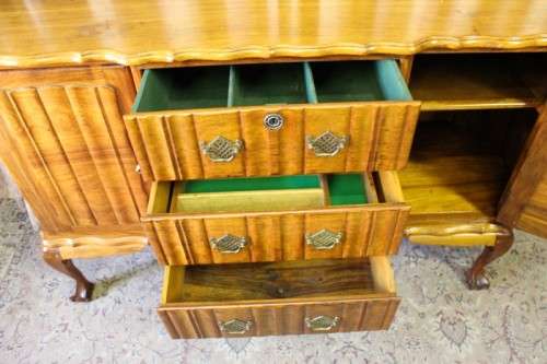 A fabulous vintage ball & claw buffet/ side server with beautiful styled doors and three drawers