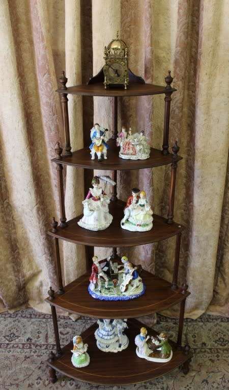 A beautiful vintage five-tier "Whatnot" display shelf  - perfect for that corner space.