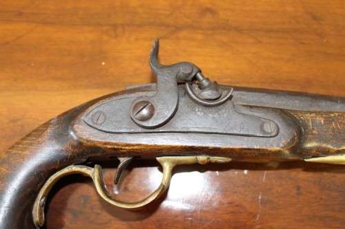 A fantastic wood with brass embellishments vintage powder pistol. Awesome display piece!!!