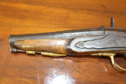 A fantastic wood with brass embellishments vintage powder pistol. Awesome display piece!!!
