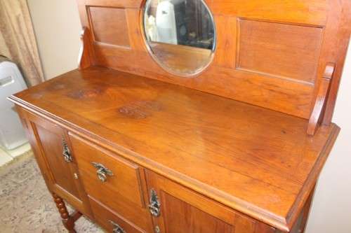 A stunning antique oak side server cabinet with a bevelled mirror, loads of drawer & cupboard space