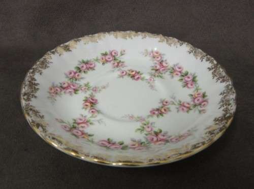 A beautiful, elegant vintage "Royal Albert" fine bone china "Dimity Roses" pattern trio. Price/trio