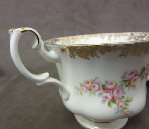 A beautiful, elegant vintage "Royal Albert" fine bone china "Dimity Roses" pattern trio. Price/trio