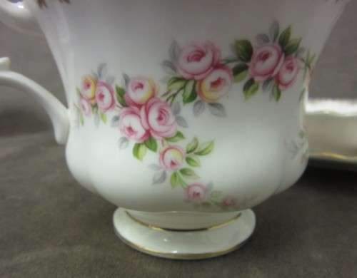 A beautiful, elegant vintage "Royal Albert" fine bone china "Dimity Roses" pattern trio. Price/trio