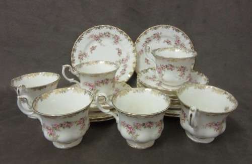 A beautiful, elegant vintage "Royal Albert" fine bone china "Dimity Roses" pattern trio. Price/trio