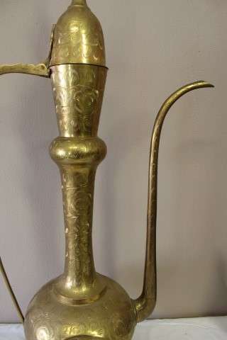 A beautiful large vintage solid brass Aftaba with ornate hand chased detailing. Lifespace Sale