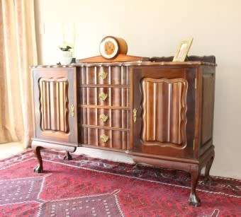 A fantastic vintage Imbuia ball & claw buffet/ side server w/ beautiful styled doors & four drawers