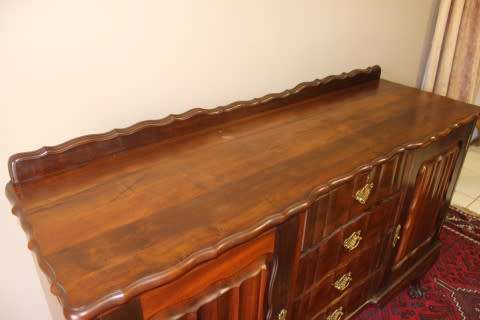 A fantastic vintage Imbuia ball & claw buffet/ side server w/ beautiful styled doors & four drawers