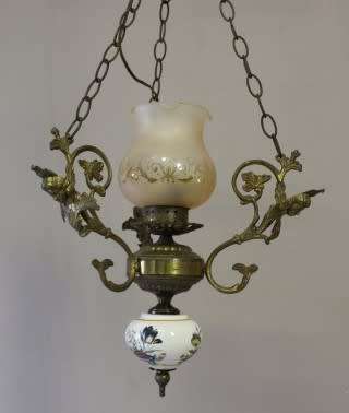 A fabulous, elegant brass and porcelain ceiling light/ chandelier. Amazing in formal living areas!!!
