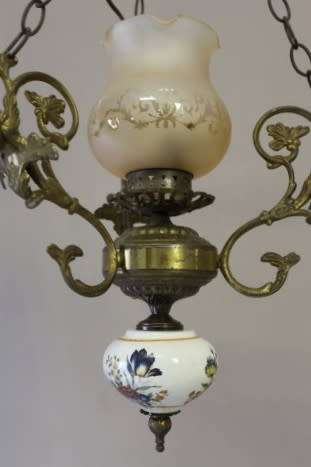 A fabulous, elegant brass and porcelain ceiling light/ chandelier. Amazing in formal living areas!!!