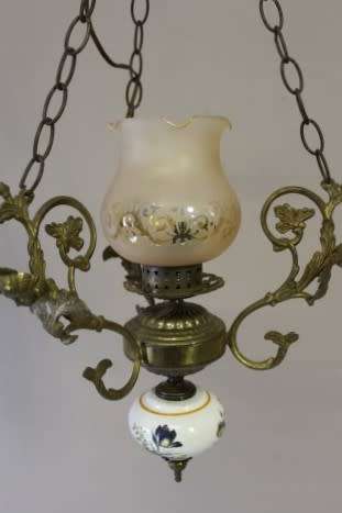 A fabulous, elegant brass and porcelain ceiling light/ chandelier. Amazing in formal living areas!!!